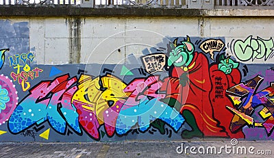 The city graffiti on the cement wall Editorial Stock Photo