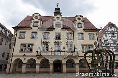 City Hall building in Sigmaringen. On the right, the fountain is decorated according to the Easter tradition Editorial Stock Photo