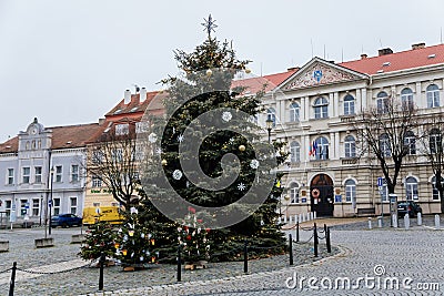 City hall with Christmas decoration, Christmas tree at Karlovo namesti town square in Roudnice nad Labem, Central Bohemia, Czech Editorial Stock Photo