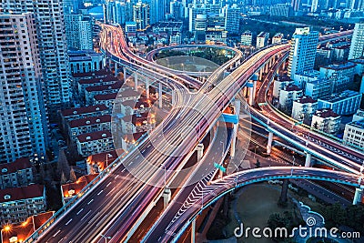 City interchange with tail lights Stock Photo