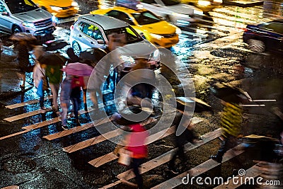 New York City at Night Cross Walk With Time Lapse Motion Blur Stock Photo