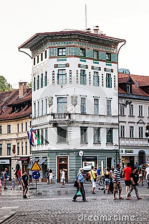 City life of Ljubljana in Slovenia. Historic building and people Editorial Stock Photo