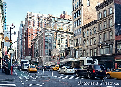 City Life and traffic on Manhattan avenue Ladies` Mile Historic District at daylight , New York City, United States. Editorial Stock Photo