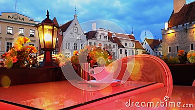 City Light blurred bokeh Lifestyle Street cafe tables restaurant city light Old Town Tallinn town square reflection abstract Aut Stock Photo