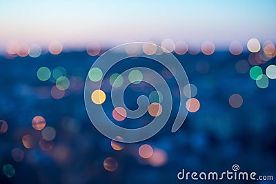 City lights abstract circular bokeh on blue background Stock Photo