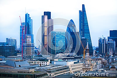 City of London at sunset. Famous skyscrapers City of London business and banking aria view at dusk. London, UK Editorial Stock Photo
