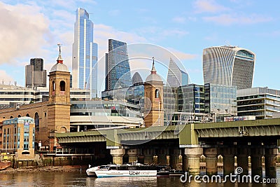 City of London and uber water taxi boat Editorial Stock Photo