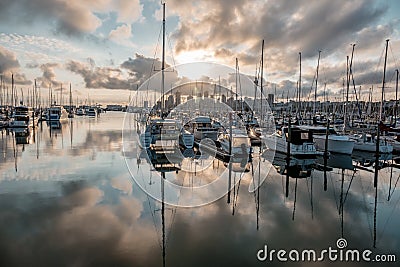 City marina skyline with yacht masts on the foreground Editorial Stock Photo