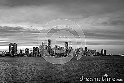 City of Miami Florida, sunset panorama with business and residential buildings and bridge on Biscayne Bay. Skyline night Editorial Stock Photo