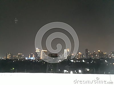 City nightscape from train station building Stock Photo