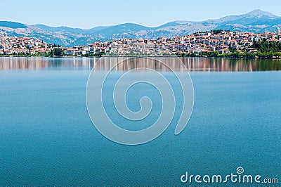 City with orange roofs by the sea Stock Photo