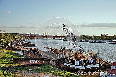 City river with old cargo ships Editorial Stock Photo