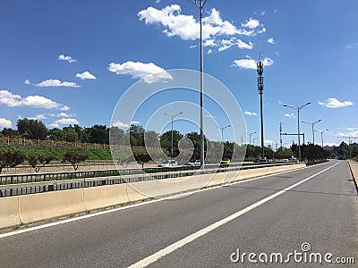 City Road View of Beijing with Green Plants under Blue Sky Editorial Stock Photo