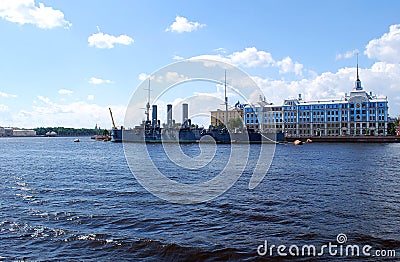 View of the Petrogradskaya embankment and the cruiser `Aurora` on a clear summer day. Editorial Stock Photo