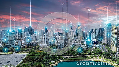City scape with connecting dots for networking in twilight. Internet globalization concept. Selective focus Stock Photo