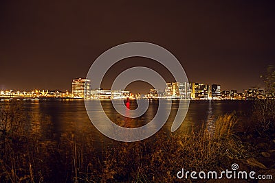 City sights of Amsterdam at night. General views of city landscape. Stock Photo