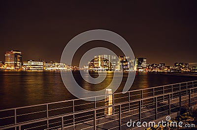 City sights of Amsterdam at night. General views of city landscape. Stock Photo