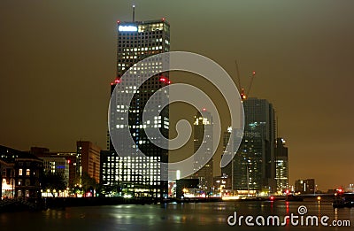 City skyscrapers night lights river Editorial Stock Photo
