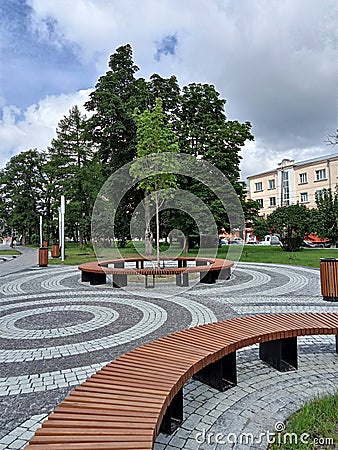 City square with a decorative tiles, benches and trees in Penza, Russia Editorial Stock Photo