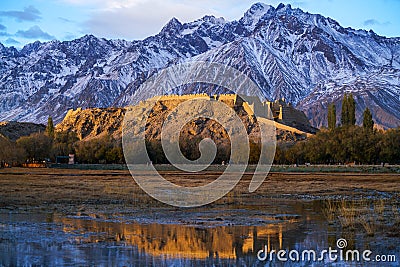 City of stone at sunrise in Autumn, Taxkorgan Editorial Stock Photo