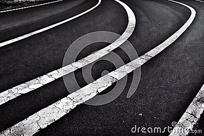 City street with crooked road lines geometric pattern abstract seamless highway background. Aged grungy urban roadway Stock Photo