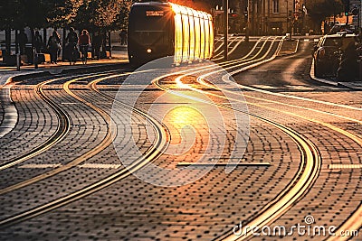 City street scene with tramway at sunset in Bordeaux, France Editorial Stock Photo