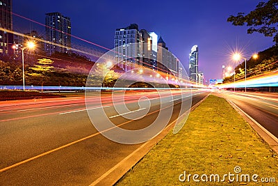 City street and traffic at night Stock Photo