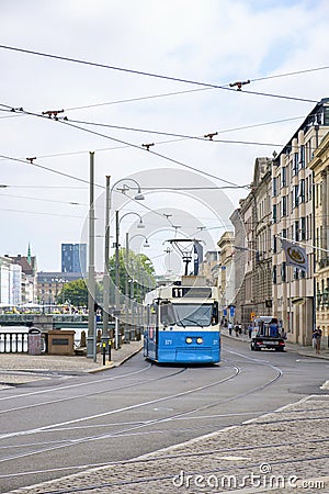 City street with a tram in Gothenburg Editorial Stock Photo