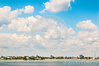 City summer landscape near lake cloudy sky Stock Photo