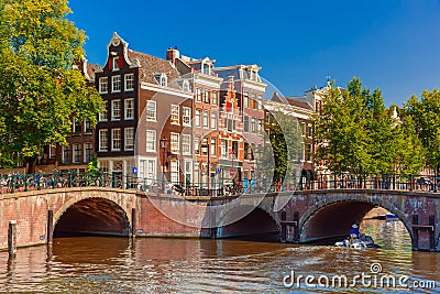 City view of Amsterdam canal, bridge and typical Stock Photo