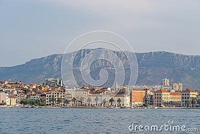 City view of riva with distant Mount Morso in early morning in Split old town in Croatia Editorial Stock Photo