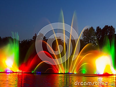The city of Vinnytsia is a waterfront near the Roshen plant, in the evenings the fountain shows a laser show for Stock Photo