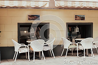 City vintage cafe in the street. Restaurant exterior and interior Editorial Stock Photo