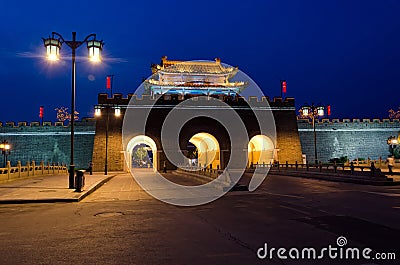 City Wall Gate at night in Qufu, China Stock Photo