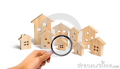 City of wooden houses on a white background. The concept of urban planning, infrastructure projects. Buying and selling real Stock Photo