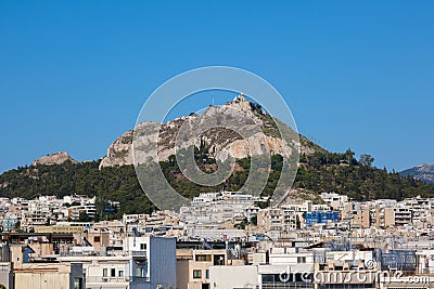 Cityscape of Athens with Lycabettus Hill Editorial Stock Photo