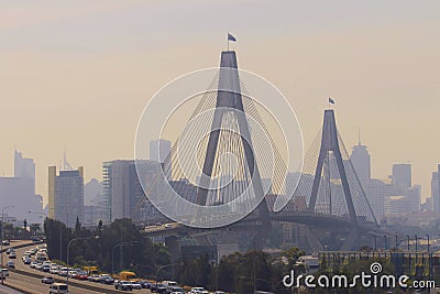 Cityscape of bridge and buildings with bush fire smoke haze Editorial Stock Photo