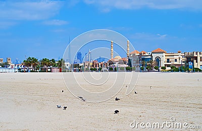 The cityscape with Burj Khalifa silhouette and minarets, Dubai, UAE Editorial Stock Photo