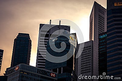 Cityscape with city skyscrapers silhouettes against sunset sky of Singapore Asian financial center Editorial Stock Photo