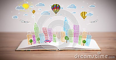 Cityscape drawing on open book Stock Photo