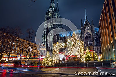 Cityscape - evening view of the Christmas Market on background the Cologne Cathedral Stock Photo