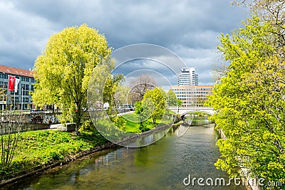 Cityscape of Hannover City with a river and buildings and green trees in April in Germany Editorial Stock Photo