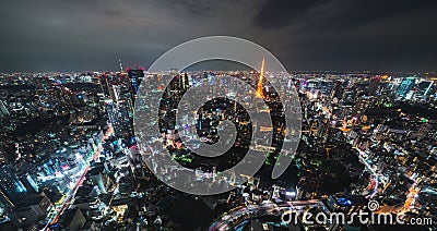 Cityscape high angle view Tokyo city downtown district with Tokyo Tower and light trail of car traffic transportation at night Stock Photo