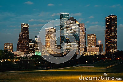Cityscape image of the Houston skyline at night, from Eleanor Tinsley Park in Houston, Texas Editorial Stock Photo