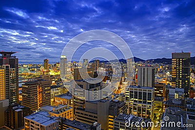 Cityscape of Kobe bay in sunset twilight view, Kobe city, Japan, Kobe Harborland is shopping and entertainment district of Kobe`s Editorial Stock Photo