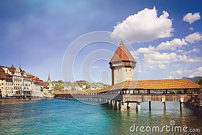 Cityscape of Lucerne with famous Chapel Bridge and lake Lucerne, Switzerland. Retro filter Stock Photo