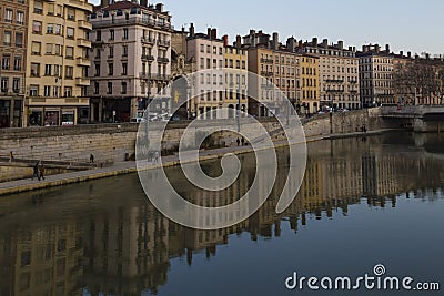 Cityscape of Lyon city by the river with building reflections on the water Editorial Stock Photo
