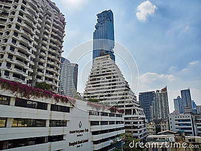 Cityscape and new office buildings near Silom on the background of the old slums of Bangkok Editorial Stock Photo