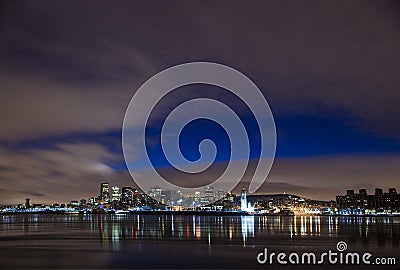 Cityscape night scene Montreal Canada river Stock Photo