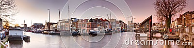 Cityscape, panorama, banner - view of city channel with ships, the city of Leiden Editorial Stock Photo